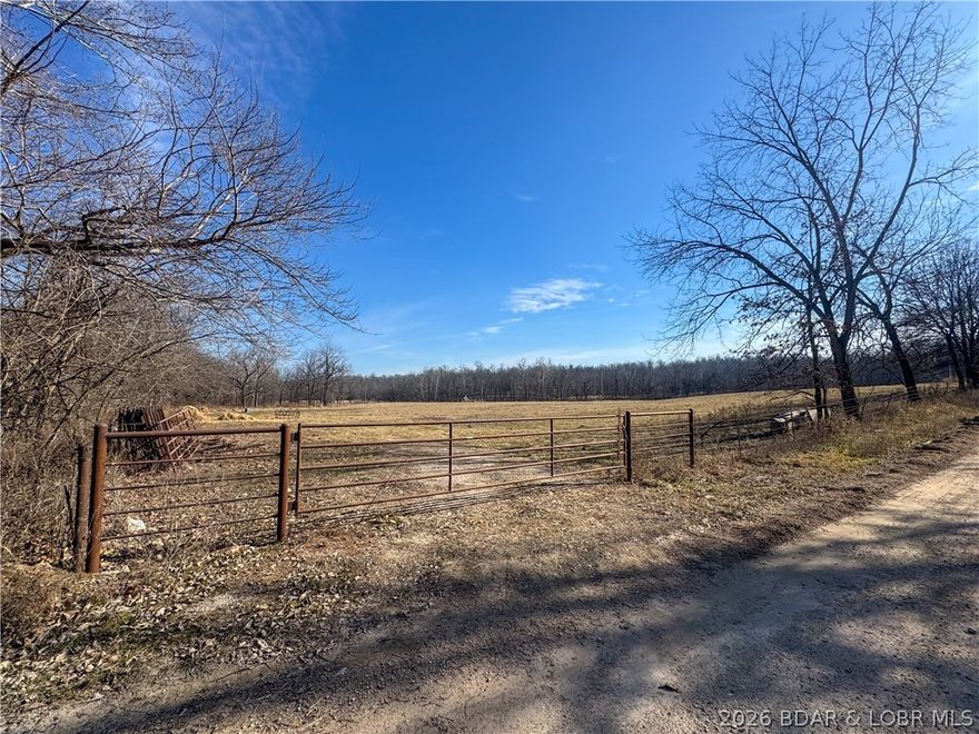 Check out this beautiful 80.76-acre property! Featuring quality open flat ground that was fertilized in 2025, this land is ready to support your agricultural or livestock operation.  This 80 plus acres would also be a great place to build your dream home. The property is well-equipped with automatic Johnson cattle/horse water and two hydrants for convenient water access.  A wet weather creek winds through the property, adding both character and a natural water source, while a private well installed November 2024 provides additional reliability. The property also features a well-built heavy water gap, making it functional and practical for livestock management. With over 3,800 feet of road frontage, access and visibility are outstanding, offering flexibility for future use. Nature lovers and hunters will appreciate the abundant wildlife, including turkey and deer, making this property as recreationally appealing as it is functional. Whether you’re looking to expand your farming operation, run cattle, or enjoy a private recreational retreat, this versatile acreage offers endless potential.  Beautiful property ready for its new owners!