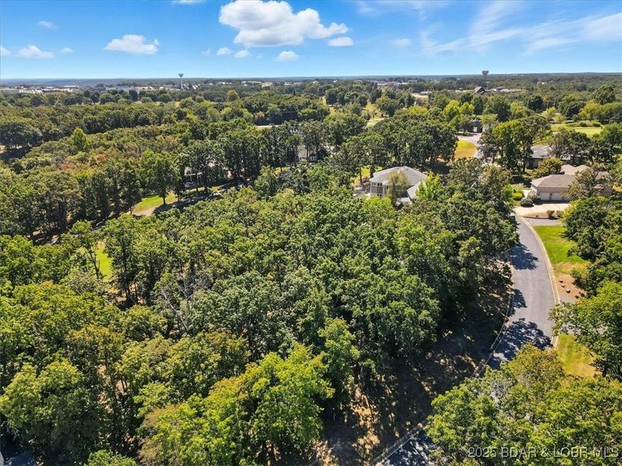 Fantastic opportunity to build your dream home on this residential lot located in a well-established neighborhood in Osage Beach. This property offers a truly unique setting with a beautiful lake view from the backyard overlooking hole 11 of the golf course, and an additional water view from the front of the property of another lake across the street.

Surrounded by attractive homes and mature trees, this lot provides the perfect balance of privacy and community. Enjoy the convenience of being just minutes from shopping, dining, entertainment, and all the amenities that make Osage Beach such a desirable place to live.

Whether you’re envisioning a full-time residence or a vacation retreat at the lake, this lot delivers scenic surroundings, recreational opportunities, and an unbeatable location to bring your vision to life.