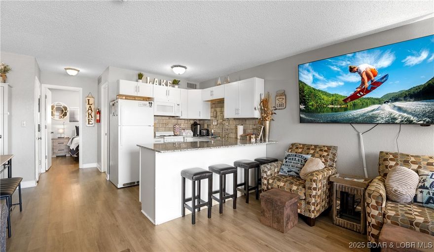 SUPER CUTE 1 Bed / 1 Bath Updated condo is ready for your SUMMER FUN! Kitchen has newer cabinets, granite counter tops, stylish backsplash. Easy care flooring. Tastefully decorated & furnished PLUS 10 x 24 Boat Slip & Lift AND PWC Slip & Lift included! Perfect location at the 24MM in Osage Beach off KK - close to Margaritaville, numerous restaurants & destinations by land and water. Experience the quiet enjoyment that second tier brings without sacrificing a nice view. Very few steps to the door. Weston Point is known for the large park-like setting, wonderful lakeside pool, tennis court, laundry facilities on site and boat trailer parking. Looking for income? This unit has rental history! Here is your budget friendly chance to get started at the Lake or add to your investment portfolio.