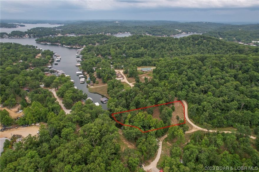 1.12 ACRE tract at the back of the cove offering lake frontage and creek frontage. This piece lays excellent and has water and sewer hook ups already in place. Subdivision boat ramp is also included. Country living with a little bit of lake living!