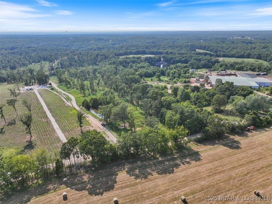 Looking for land with freedom and flexibility? This 12.56-acre parcel just outside of Eldon.  With no restrictions, you can bring your vision to life—whether you’re dreaming of a custom home, barndominium, tiny house, manufactured home, RV living, hobby farm, or homesteading. A small pond is located on the property as you enter the property. Also, a great opportunity to build a larger pond. 

This property features a mix of open areas and lightly wooded sections, offering multiple potential build sites and ample room for outbuildings, livestock, gardens, or recreational use. Electric located at the road. Buyers must be accompanied by an agent. NO TRESPASSING.