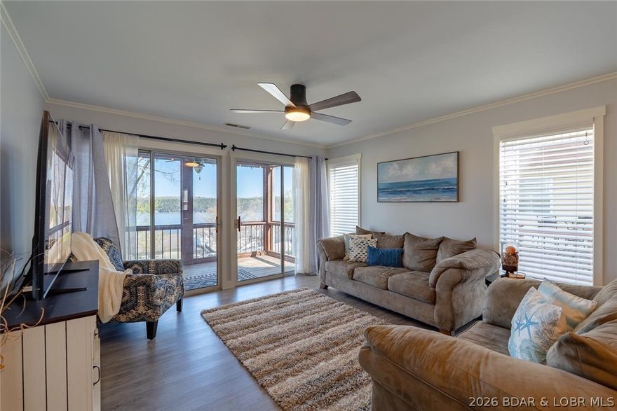 Indulge in breathtaking waterfront views from this beautifully appointed 2-bedroom, 2-bath condo featuring an open-concept living area and kitchen, perfect for entertaining. Both bedrooms offer comfortable accommodations, and the screened-in balcony with storage is ideal for relaxing, sunset watching, or enjoying lake activity. This unit is being sold turnkey and fully furnished, making it completely move-in ready for summer. Located at the 22 MM in the heart of Osage Beach, you’ll love the convenience to popular restaurants and entertainment by land or water. The community offers great amenities including a swimming pool, basketball court, and playground. A brand-new community concrete dock that is being installed right now adds to the appeal, along with your own 12x32 boat slip for easy access to the water. Whether you're looking for a personal getaway or rental investment, this condo offers the perfect blend of relaxation and convenience for lake life.