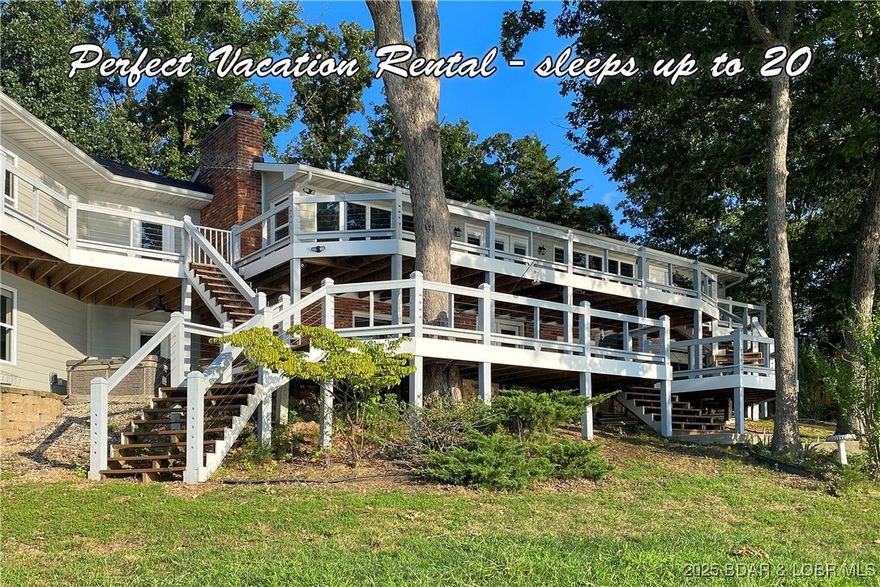 PERFECT VACATION RENTAL - sleeps up to 20+ people. And there's a stellar view of the Four Season Fireworks Shows. Endless opportunities for Pool Designs. 2,200 sq.ft. Cruiser Dock with concrete pavers, AND wavebreak, are INCLUDED. Here's the home everyone has been waiting for... it checks off all of the boxes. Directly across from Grand Pointe Island and Porto Cima, you will have a front row seat to all of the Lake's boating activity. HUGE panoramic view overlooking the 13MM, irreplaceable "gentle" topography, and 210-ft of premium waterfrontage (cove protection, main channel view, and deep water). Located in the same cove as Lake House13 and close to countless waterfront restaurants, and Lake amenities. Over 4200 sq.t. and 5 bedrooms (6thbedroom possible). Approx. 12,000+ sq.ft. "ranch" Building Envelope for an alternate home design. Endless dock options. No HOA or subdivision restrictions. This home is currently Under Construction. PERFECT WF LOT to build 1 or 2 "new" construction homes.