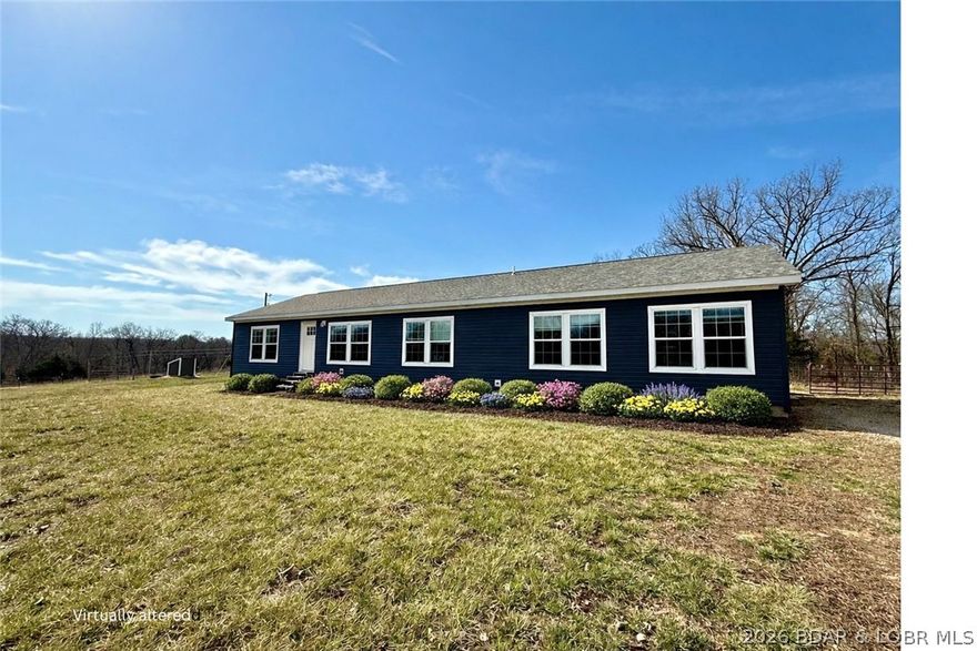 Family homestead, hunting property, and peaceful country retreat all in one. Built in 2023, this 4-bedroom, 3-bath home offers the benefit of newer construction with newer appliances, HVAC, and roof, plus a spacious one-level layout designed for everyday living. Inside, you’ll find an open concept floor plan filled with natural light, a large kitchen with dining bar, coffee bar, adjoining dining room, and two separate living spaces to give everyone room to spread out. The primary suite features a large walk-in shower and double sinks, while the Jack-and-Jill bath between the spare bedrooms is ideal for family convenience. Step outside to 60 acres of privacy with trails, pasture, partly wooded ground, cross fencing, and abundant deer and turkey for outstanding hunting potential. The land was thoughtfully logged with a forester to improve wildlife habitat, with mature trees still remaining. A 1,230 sq. ft. shop, chicken coop, and additional animal storage buildings add versatility for livestock, hobbies, storage, or recreation. All of this in a private setting close to the Big Buffalo Conservation and town for shopping and restaurants.