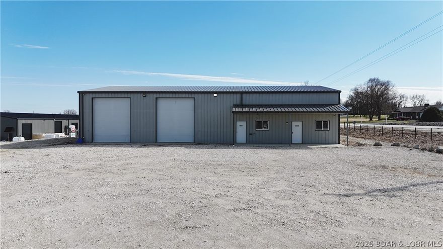 Welcome to your ultimate workspace wonderland, conveniently located just outside of Eldon city limits (because who needs zoning, am I right?) This impressive property features a massive 2,750 sq ft heated and cooled shop with central heat and air. Stay comfy while you tackle projects—no more sweating in summer or freezing in winter!But wait, there’s more! You also get a spacious 1,250 sq ft office space to show off your entrepreneurial skills—or set up a cozy corner for those “important” snack breaks. Plus, another 1,250 sq ft of storage for stashing your treasures or future side hustles.Everything is spray foamed and equipped with a brand-new central HVAC system, meaning you can breathe easy and focus on your work. With two garage doors, access is a breeze!This space would make a great mechanic shop or whatever business you want to launch in booming Eldon, MO! Whether you’re starting a new venture or creating the world’s greatest man cave, the possibilities are endless.Don’t miss out! Schedule a showing today and dive into your adventure outside of Eldon city limits. Who said work couldn't be fun?