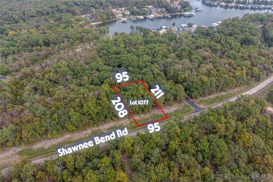 Nice and level building lot off of Shawnee Bend Rd. Power overhead and water sewer hookup fee of only $9,757. Enjoy all of the four seasons amenities. Great spot for a spec home or your custom dream home! Short distance off State Rd MM and Lake Ozark/Osage Beach!