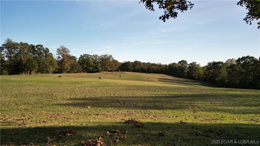 A rare development-ready property located in one of the most sought-after areas on the West side of the Lake of the Ozarks. With prime frontage directly off “O” Road and located across from Indian Rock Golf Course, the visibility and accessibility are unbeatable. The property includes 10+ acres and offers an additional access point from Deer Valley Lane—making it ideal for a future residential development, private estate, or multi-use investment. Don’t miss your chance to build where demand is growing and location is everything. The adjoining pro shop and/or 60x60 building are also available for purchase at an additional cost, offering even more opportunity for expansion or functionality.
