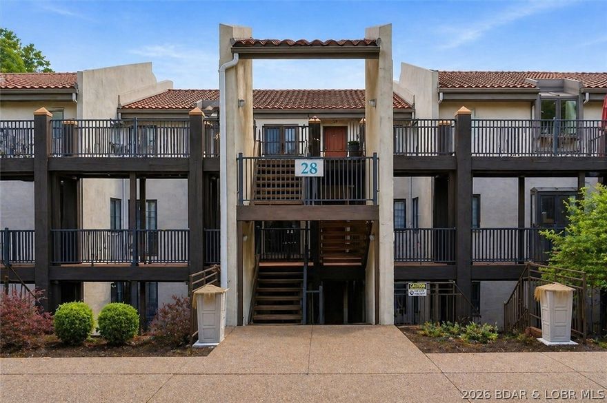 Spacious 2-bedroom, 2-bath condo in Osage Vistas (formerly Four Seasons Racquet & Country Club), set on 23 acres of beautifully landscaped grounds. Conveniently located off Horseshoe Bend Parkway and just 10 minutes from shopping, restaurants, and nightlife. This community features its own marina and includes access to Four Seasons amenities.
This second-floor unit, with minimal steps, offers a comfortable layout with open living and dining areas. Enjoy the sunroom with views of one of the community’s six pools, along with a panoramic treetop view of the Ozark hills—bringing a relaxing, elevated feel from inside the home.
The split-bedroom design provides added privacy. Both bathrooms feature jetted tubs and separate walk-in showers, creating a spa-like experience.
Ideal for full-time living, a weekend getaway, or an investment opportunity. 1-year home warranty included.