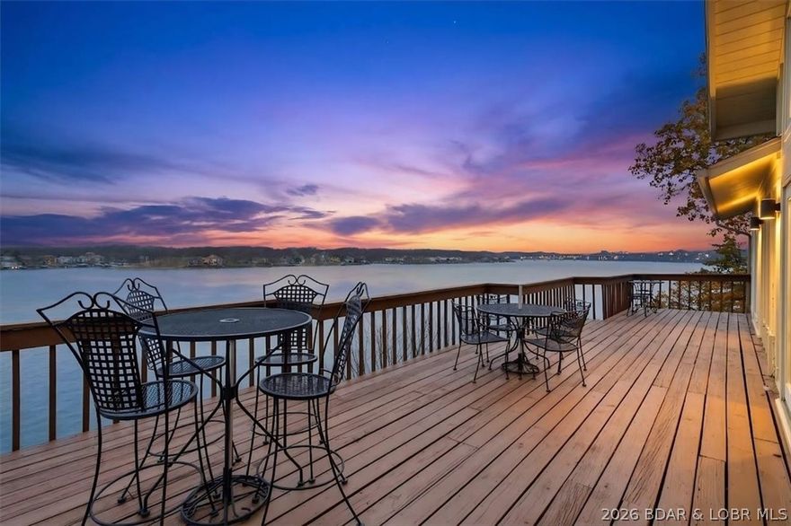 *1st time on Market in 20 years* Piece of Paradise Priced Right!!! This little piece of Heaven is waiting for you on 17 Mile Marker and it would make a fantastic Short term rental investment or full time home. *360 Degree Views* of the Lake from 2- Huge Decks seeing Sunsets that will take your breathe away, 2- Family Rooms, Huge wet bar, gas fireplace on both Levels, Sunporch off kitchen with Spectacular Views of the Lake to enjoy your coffee, & a formal dining room, **This is Priced to sell Now, it's way below appraisal value last yr for $990,000!** Main level has laundry off kitchen, 3- Bedroom Master piece, Master has a walk-in glass shower, and jetted tub. Total of 4.5 Bathrooms! 2- Car att. Oversized Garage. parking is not only Flat, but parking for about 10 cars, gas hook up for BBQ on deck, laundry room on both levels, 2 bedrooms and 3 bathrooms on lower level, huge living room too. *Main Level Living if you prefer!* Absolute Best location to be for Lake events and Action, Fireworks lighting up the sky line, close by is All your shopping, Restaurants, Backwater Jacks is 2 minutes away! NO HOA! Seller will Credit $10K for Sliders replaced on Sunporch!!