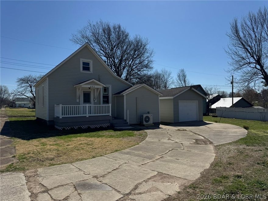 Completely remodeled 2-bedroom home located in Cole Camp! This move-in ready property features numerous updates including a newer roof, updated heating and cooling system, new flooring, and fresh interior paint. The home offers a comfortable layout with modern finishes throughout. A detached garage provides additional storage and parking space. Conveniently situated within walking distance to downtown Cole Camp, giving you easy access to local shops, dining, and amenities. A great opportunity for a primary residence or investment property!