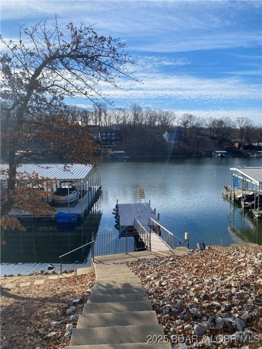 Live the Lake Life! Fun, Relaxed Condo with Views & Water Access.  Welcome to easygoing lake living in this 2-bedroom, 2-bath condo with a great lake view and direct lake access. Whether you’re sipping coffee while watching the water or heading out for an afternoon adventure, this place is all about enjoying life by the lake.  Spend your days kayaking, paddle boarding, or paddle boating, all just steps from home. Want to explore more? Freedom Boat Rental is next door and makes it easy to get out on the water whenever the mood strikes—no boat ownership needed. Freedom Boat Rental HAS BOAT SLIP RENTALS too..so if you have a boat and need a place to keep it - this works out great!  Perfect as a full-time home, weekend escape, or vacation spot.  Motivated sellers and ready to make a move—don’t miss your chance to grab this fun, lakefront lifestyle. Come check it out and start making memories!