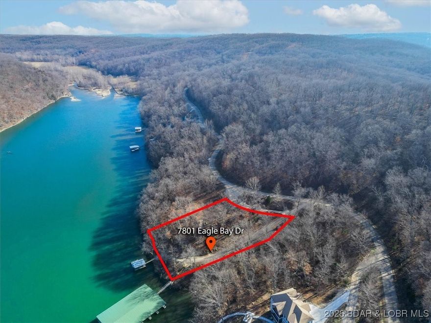 Come Check out this Lakefront 1.3 Acre lot located at Eagle Bay Subdivision in Gravois Mills MO! This Lot is already equipped with a wooden dock with a 10x20 slip. Not only is this a wonderful lot in a great subdivision, it has been cleared and is ready to be built on. With 226 ft of lakefront on the quiet waters at the 55 mile marker yet still close to waterfront restaurants and town. Central sewer and central water are in place. Schedule a tour, take the plunge and build your Dream Lake Home!