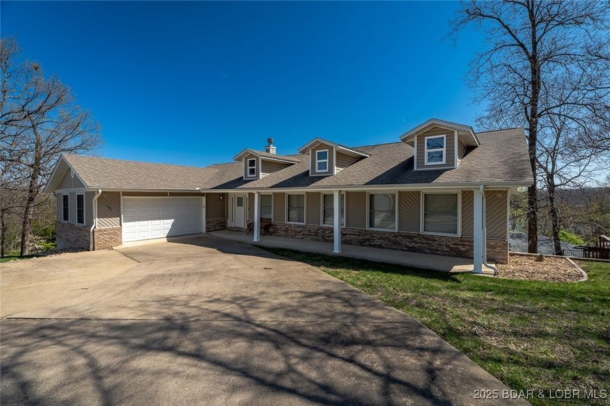 BIG....BOLD....AND BEAUTIFUL....describes this Sprawling Lake View Home with almost 5,000 Square Feet of Living Space. Home has 6 Bedrooms (3 on each level), 4 Bathrooms, 2 Full Kitchens, 2 Fireplaces, Living Room and Family Room, Along with a Game Room. GRANITE COUNTER TOPS, WOOD FLOORS, Upper and Lower Decks with part of it Screened and Covered are just some of the appointments in this fine home. Enjoy both Lake Views and Direct Lake Access with 2 Dedicated Boat Slips (10x24 and 10x20) Plus Three PWC Slips included in the Community Dock. Recent Updates Include NEW CARPET, UPDATED KITCHEN APPLIANCES, & CABINETS, ETC. The home also features: TWO FULL KITCHENS, Multiple Spacious Living Areas, and generous deck space ideal for relaxing or hosting guests. With GARAGE SPACE FOR UP TO "6 VEHICLES" and a total layout built for versatility and ease, this property offers exceptional space, style, and convenience......SEE "ATTACHMENTS" FOR THE FULL LIST OF UPDATES. Located in the Heart of Osage Beach giving you access to ALL THAT THE LAKE HAS TO OFFER BY LAND AND WATER......