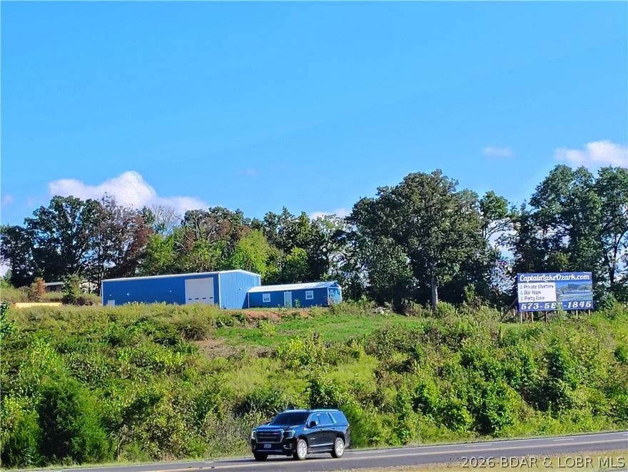 Location! Location! Location! This high visibility highway 54 frontage property is ready for you to take it to the next level. This location has been used for boat detail and repair but also can be a great location for any business needing highway exposure and privacy! A big asset is having your own Billboard with priceless exposure and endless possibilities! Billboard can be improved and expand to maximize your Business. Hurry this property won't last long!