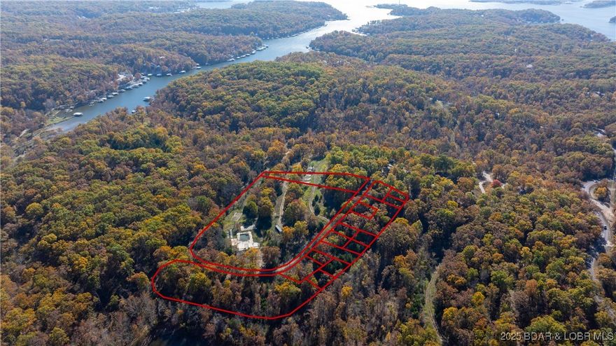 Back on the market through no fault to the seller! Discover the perfect blend of nature, space, and opportunity with this beautiful 7+ acre property (16 parcels total) — once a beloved campground and now ready for its next chapter! Tucked away in a peaceful setting, this land offers mature trees, gentle terrain, and plenty of room to bring your vision to life. Whether you’re dreaming of a private getaway, developing a new campground or RV park, building your dream home, or investing in a unique business opportunity, this property provides a versatile foundation. With its previous campground infrastructure, you will find existing utility connections, driveways, or clearings already in place along with an old concrete swimming pool & a tennis/basketball court — a great head start for your plans. Enjoy the tranquility of wide-open space while still being within easy reach of the lake & local amenities, shopping & restaurants. MOST OF THE PROPERTY LINES ARE NOT MARKED. PLEASE DO NOT GO OUT UNACCOMPANIED.