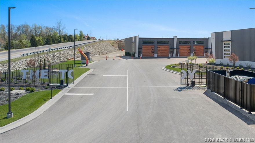 New for 2026 the "Dual Mezz" designed to really show off your lifestyle, featuring two mezzanines connected by a walkway. The rear mezz has a bedroom with a walk in closet and full bath with the forward mezz surrounded by railing makes the perfect space to relax or give the kids a place to do their thing. The lower level offers a complete full kitchen, stainless appliances and a uber cool epoxy floor that matches the kitchen countertops. All units are fully customizable so you can make yours as tailored to your style as you want. Come join The Toy Box where we have a lifestyle for you on the Midwest Coast, Lake Ozark.