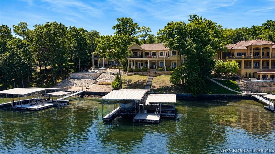 Experience lakefront living in Porto Cima at the 17MM with beautiful main channel views and over 3,500 sq ft designed for entertaining, relaxing, and hosting family and friends. Large windows throughout the home fill the space with natural light while bringing the lake views into the main living areas. The main level offers an inviting open layout with spacious living areas, a well-appointed kitchen, lakeside primary suite with deck access, second bedroom, and 3/4 bath. The walkout lower level expands the living space with a second full kitchen, large family room, second primary suite, additional lakeside third bedroom, full bath, and nonconforming bedroom ideal for guests. Outside, enjoy a circular driveway, 2-car garage, mature trees for privacy, and a gentle approach to the water. Whether you're searching for a full-time residence or a weekend retreat, this property offers the space, location, and lakefront lifestyle buyers are looking for. Come join the sought-after community of Porto Cima with the many Four Seasons amenities.