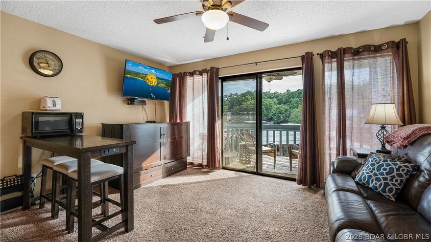 Don’t miss this well-maintained walk-in level 1 bedroom, 1 bathroom condo at Heron Bay Condominiums, ideally located at the 21MM of Lake of the Ozarks. This prime location offers convenient access to many of the lake’s most popular attractions by both land and water, making it perfect for relaxation and recreation. This turn-key unit includes a 10x24 ft. boat slip, all furnishings, décor, and electronics, allowing you to start enjoying lake life immediately. The open layout flows seamlessly to a walkout deck that provides a great space for outdoor entertaining or unwinding after a day on the water. Heron Bay is a well-established complex
featuring a community pool, boat ramp, boat trailer parking, tennis courts, and more. Whether you’re searching for a weekend retreat, a full-time getaway, or a strong rental investment opportunity, this condo checks all the boxes for easy, enjoyable lake living.