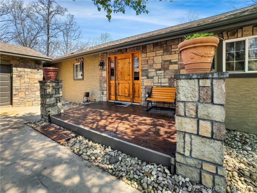 Beautiful Home in Linn Creek on 3 acres in a quaint rural setting within 2 miles of Camdenton and Lake of the Ozarks. 3 Bedroom 3 bath room Country home just minutes away from the lake. The primary bedroom is large enough to live in.  Two car garage with working area and two additional storage buildings for your use. Gardening shed, play house, work shop, what ever you imagine. Decks off of living room and primary bedroom to add to the homes functionality and enjoyment. Concrete patio and outdoor fire pit to enjoy the outdoor area and the animals that pass by. Schedule you appointment to come see this great home today.