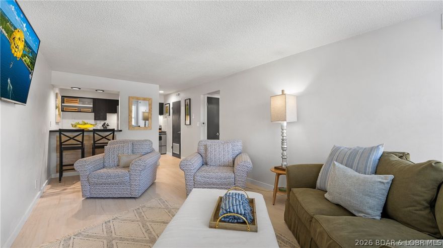 This MOVE-IN ready 2bed/1bath end unit condo is located in the heart of Osage Beach, comes TURN-KEY and has been recently remodeled! It sits on the top floor (only 1 set of stairs up) so you no need to worry about noise from neighbors above you! New LVP flooring throughout main living spaces, new carpet, refinished kitchen cabinets, tile backsplash, new countertops, new appliances, refinished doors and less than a year old furniture! Complex offers plenty of parking, steps away from the community pool that has an amazing view of the Osage 19MM AND a location on land that doesn't get much better because you're surrounded by entertainment, grocery, top notch restaurants, close to schools, the hospital, etc... Laundry is located at the bottom of the building through a secured door and you ALSO get a secured storage closet beyond that for extra space if needed! Whether you're in the market for full time living or a weekend get-away, this place should be at the top of your list to take a peek!