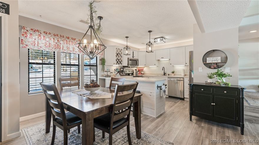 Beautifully updated waterfront condominium with stunning lake views and a 10’ x 28’ boat slip (L14). This exceptional unit offers open-concept living, thoughtful upgrades, and true resort-style amenities in one of Lake Ozark’s most desirable communities.

The primary suite features a brand-new, spa-like bath with a walk-in shower and double vanity—truly a showstopper. Updates throughout include new sliding doors in all rooms, subway tile backsplash in the kitchen, newer appliances, updated flooring, and all new interior doors. The unit is being sold furnished,making it move-in ready.

Enjoy an enlarged deck with breathtaking waterfront views—perfect for relaxing or entertaining. With only six steps to the front door, this unit offers easy access and convenience. The community is golf-cart friendly and adjacent to The Cove Golf Course (Hole #4), with The Watering Hole located by the fire pit overlooking the course.