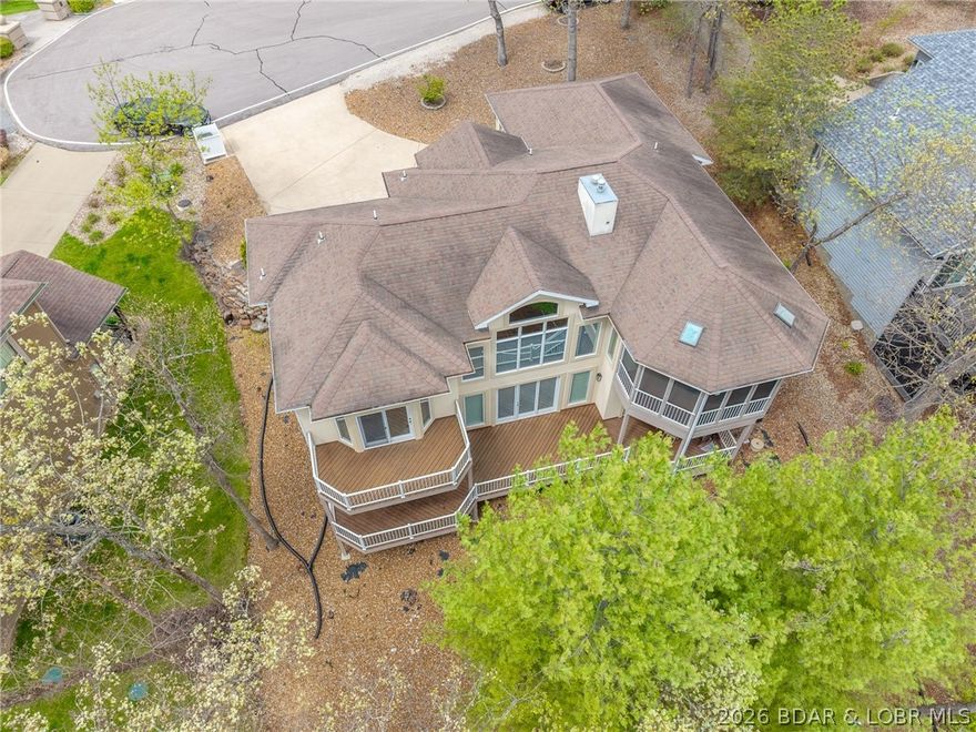 Fantastic opportunity! Four Seasons lakefront home, 3168SF, 4BR, 3.5 BA, 2-car garage, furnished, multiple decks and screened porch, cove location with dock. Full HVAC replacement in 2025 and new roof in April 2026. Home is dated but in excellent condition and was a well built home. Located at the 12 mile marker in Regency Cove at the end of a cul-de-sac. Ready for you to enjoy or update! Gentle drive, easy lakefront, great cove protection. Four Seasons amenities: Aquatic Center with indoor pool, multiple outdoor pools and pavilions, tennis, pickleball, playgrounds, boat launch and trailer storage, social clubs and community gatherings. Be sure to watch the video and ask for additional plats and details from the listing agent.