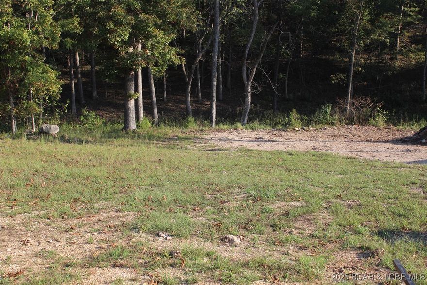 Build your dream home in the growing Woodhaven Estates subdivision in Laurie, MO! This cleared, ready-to-build lot offers convenience, community, and modern amenities in one of the most desirable areas of Camden County.

Located off a paved road with public water and sewer available and fiber optic internet in the area, this property makes building easy and future living even better. The gentle slope is perfectly suited for a walkout basement or garage, giving you flexibility in your design.

You’ll love the location—just minutes from Town & Country Grocery, great restaurants, and all the local amenities that make Laurie such a welcoming place to call home. With new homes under construction nearby, this is a great opportunity to join a developing neighborhood while prices are still affordable.

Bring your builder and your vision—this lot is ready when you are!