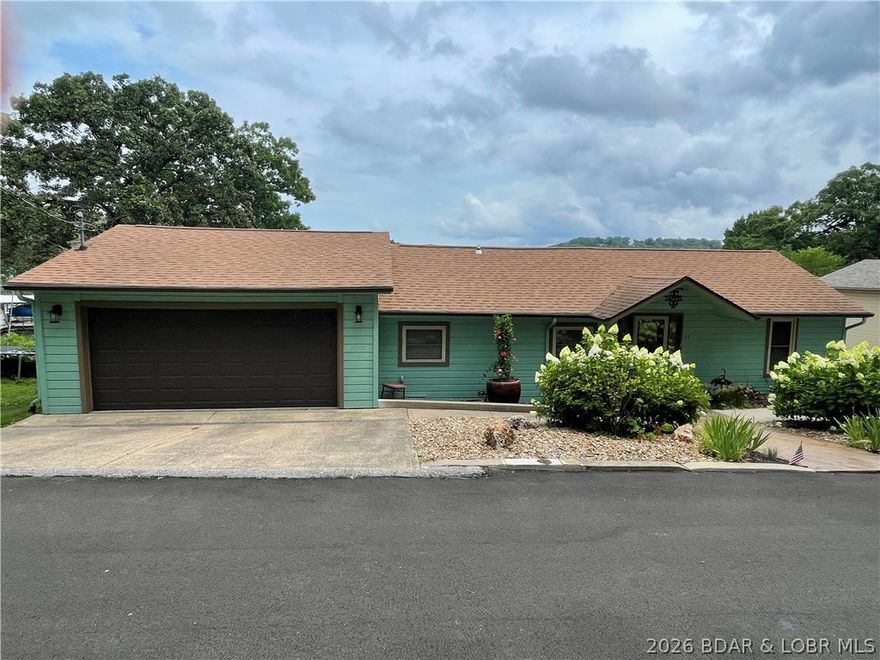 Welcome to lakefront living at its finest on the Big Niangua, 4mm! This well-maintained 3-bedroom, 2-bath home offers the perfect blend of comfort, convenience, and breathtaking scenery. Situated on a beautifully manicured, level lot, the property provides easy access to the water and stunning, unobstructed lake views that can be enjoyed year-round. Inside, the home features a functional layout with three spacious bedrooms, two full bathrooms, and a versatile flex room that can serve as an office, additional sleeping area, hobby room, or bunk space for guests. The home has been lovingly cared for and is ready for immediate enjoyment. Step outside to take in the unbelievable lake views and peaceful surroundings. Located on calm water, this property is ideal for swimming, floating, fishing, or simply relaxing by the shoreline. The private dock in year round deep water and lift are included, making it easy to keep your boat ready for a day on the water. New septic 2025 & some furnishings that will convey, making this a true turn-key lakefront opportunity—perfect as a full-time residence, weekend getaway, or investment property. Move in and start enjoying lake life right away!