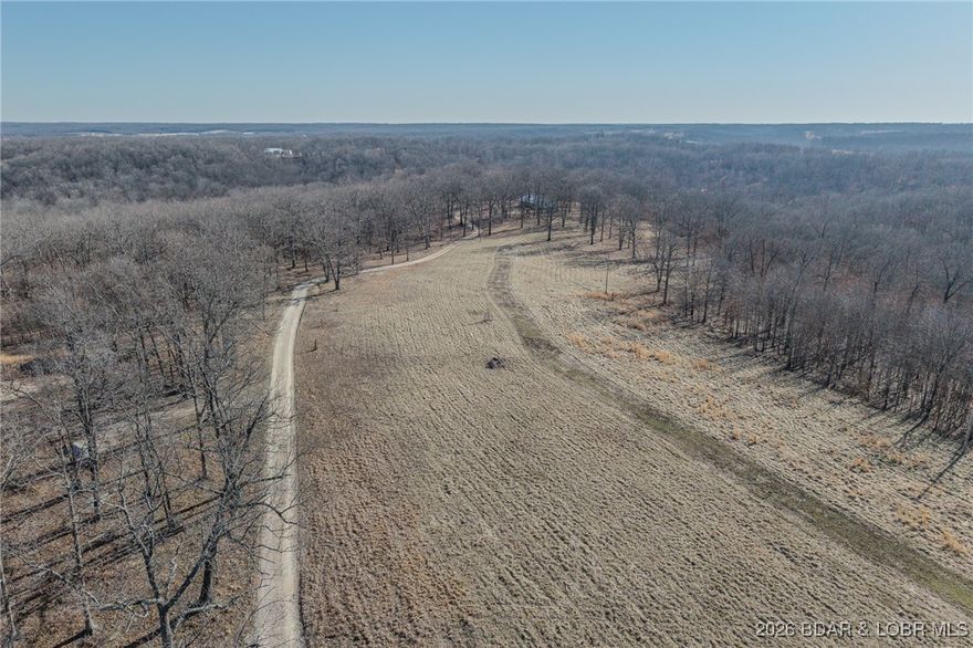 This is it! 19 beautiful ACRES located outside city limits of Lebanon, MO. Yet, only 15 minutes to town. You can have the best of country life and not give up the amenities of the city. Acreage is split between PASTURE and WOODS. Former pasture is FLAT and would lend to an easy build location. Electric pole on site, just need a meter. This is a small, gated community with a few restrictions. While mobile homes aren't allowed, RVs and trailers are for the 12 month period during construction of a residential building. MODULAR homes on a permanent, concrete foundation, no more than 1 year old at time of construction are allowed, as are SHOUSE style and BARNDOMINIUM style homes. Land is full of wildlife! Deer and turkey abound! Located close to BENNETT SPRINGS and LAKE OF THE OZARKS. Starlink is available in this area. Additional land available, check out MLS#3583717