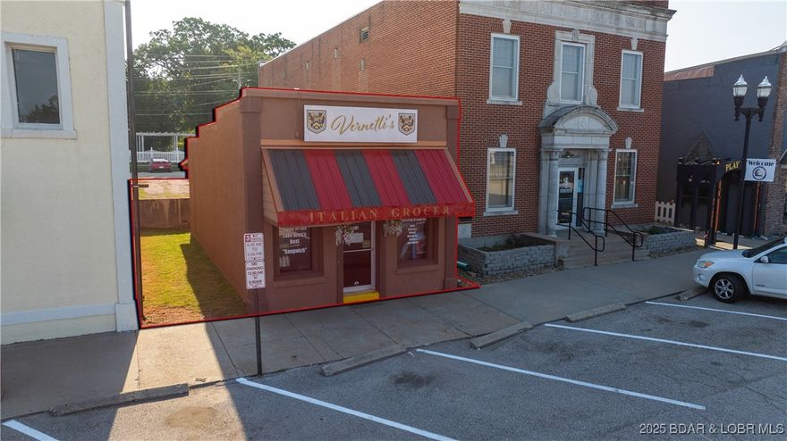 Prime commercial opportunity in the heart of Camdenton Square! This 680 sq. ft. building offers excellent visibility with 25 ft. of road frontage and ample parking in both the front and back. Conveniently located in a high-traffic area, this property provides the perfect spot for retail, office, or service-based business. With room to expand, the possibilities are endless. Secure your place in one of Camdenton’s most established and growing areas today!