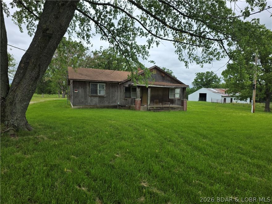Opportunity awaits at 273 Hwy 42 in Iberia, MO! This 2 bedroom, 2 bath property sits on 30 acres and offers a great chance for investors, flippers, or buyers looking to build equity. Situated on a convenient highway frontage location, this property provides plenty of space and potential for improvement and customization.

Property features a 30x40 insulated workshop with concrete floors and electricity, along with a 50x50 livestock and hay barn equipped with electric and water—ideal for hobby farming, storage, or workspace needs. Property is set up to start your own farm with a chicken coop and space for cows, goats, and more.

Outside, the property offers room for landscaping to enhance curb appeal. With the right vision, this property could be transformed into a great primary residence, rental, or resale opportunity.

Property is being sold as-is.