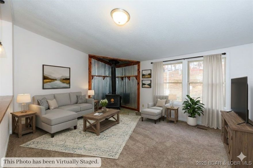 SUNSET VIEWS & SPREADING ROOM: The Hobby Farm You've Been Waiting For! Imagine coming home to a low-traffic sanctuary where the kids can run and the sunsets are spectacular. This 1.5-acre property offers the rare opportunity for true freedom with NO HOA and all the infrastructure for your small animal dreams—from the dedicated chicken coop to the goat pen. This property is an outdoor oasis designed for enjoyment and self-sufficiency. It features an included greenhouse, plenty of room for a robust garden, and a ready-to-use firepit area for year-round entertaining. The spacious 1,836 sq ft home features 4 bedrooms and 3 full bathrooms, including two comfortable ensuites. Step outside onto the expansive, large front porch that is perfectly oriented to enjoy relaxing, peaceful west-facing evening skies. Located just off Hwy Y for a quick trip into town, this property delivers on both convenience and quality of life. An oversized carport, storage shed, and a convenient wrap-around driveway complete this perfect package. Don't miss your chance to own a piece of peaceful country living just minutes from everything!