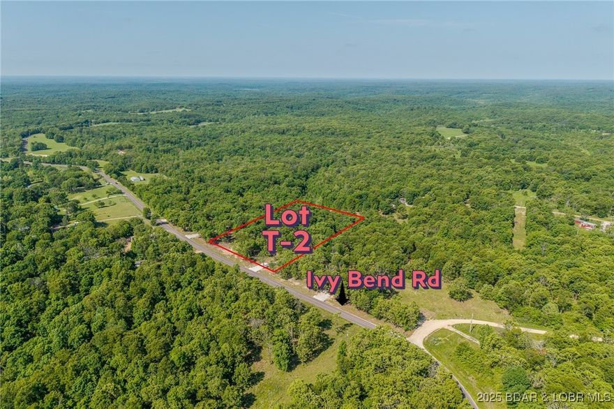 Excellent building lot consisting of 3.01 acres located on Ivy Bend rd (blacktop) just off of Hwy 135. Seller has just cleared all the under brush and installed a new rock driveway. Lot is ready to build and has electric poles on property. Minimal restrictions-All lots have been surveyed! Come stake your claim in a 3-acre parcel at beautiful Lake of the Ozarks today!