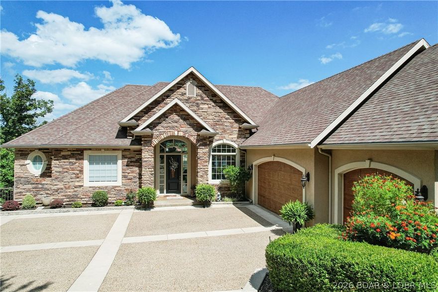 Arrange a showing on this exquisite 6 bed 4 (full) bath luxury waterfront home immediately. Located on approx. 122' ft. of quiet lakefront in a protected cove, a stone's throw from the main channel at the 2mm. The luxury appointments and finishes are too numerous to cover in this description, so here are just a few. Beginning with 10' and 12' ceilings. huge windows with ornate moldings and 8' tall doors on BOTH levels. There is a wheelchair accessible bedroom and bath on the main floor, a dream kitchen with beautifully classic cabinetry showcasing some wonderful storage accessories and very tasteful backsplash. You will love the Viking 6 burner gas cooktop, enormous island and stunning granite countertops. There is a large, screened patio adjacent to the kitchen/dining area that creates a lavish and inspiring "al-fresco" dining experience with the adjoining grill patio. All the decks on all the levels are concrete surfaces with epoxy finishes and powder coated handrails. There is a laundry room on both levels, an oversize 3 car garage and so much more.