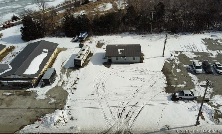 Welcome to this prime commercial property located on 65 Highway, offering excellent visibility and accessibility. This strategically positioned space boasts a new, beautifully constructed office building and ample parking space. This property is ideal for a wide range of businesses from retail to professional offices. The high traffic count ensures maximum exposure for your business. Schedule a viewing today to experience the potential of this property firsthand.