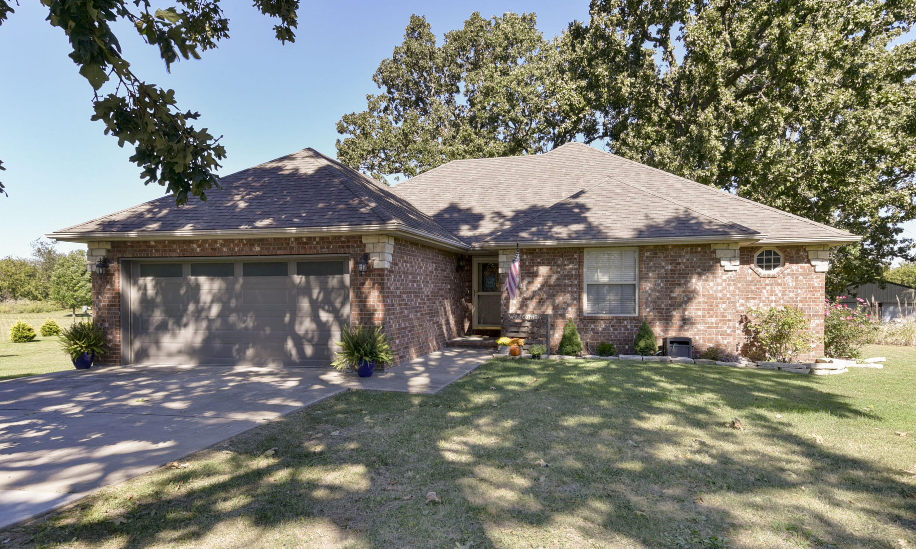 This amazing home is located on a quiet cul-de-sac just waiting for you!  It features 4 bedroom with 2 bathrooms on 3 gorgeous acres with a 30X30 Shop.  There is beautiful engineered hardwoods through out the living and bedrooms and tile elsewhere.  No carpet!  The kitchen has great quality cabinetry and granite counter tops.  Enjoy your morning coffee on your covered deck overlooking the peaceful lot with mature trees and the perfect area to have your own baseball field!  There is even an underground storm shelter for extra safety.