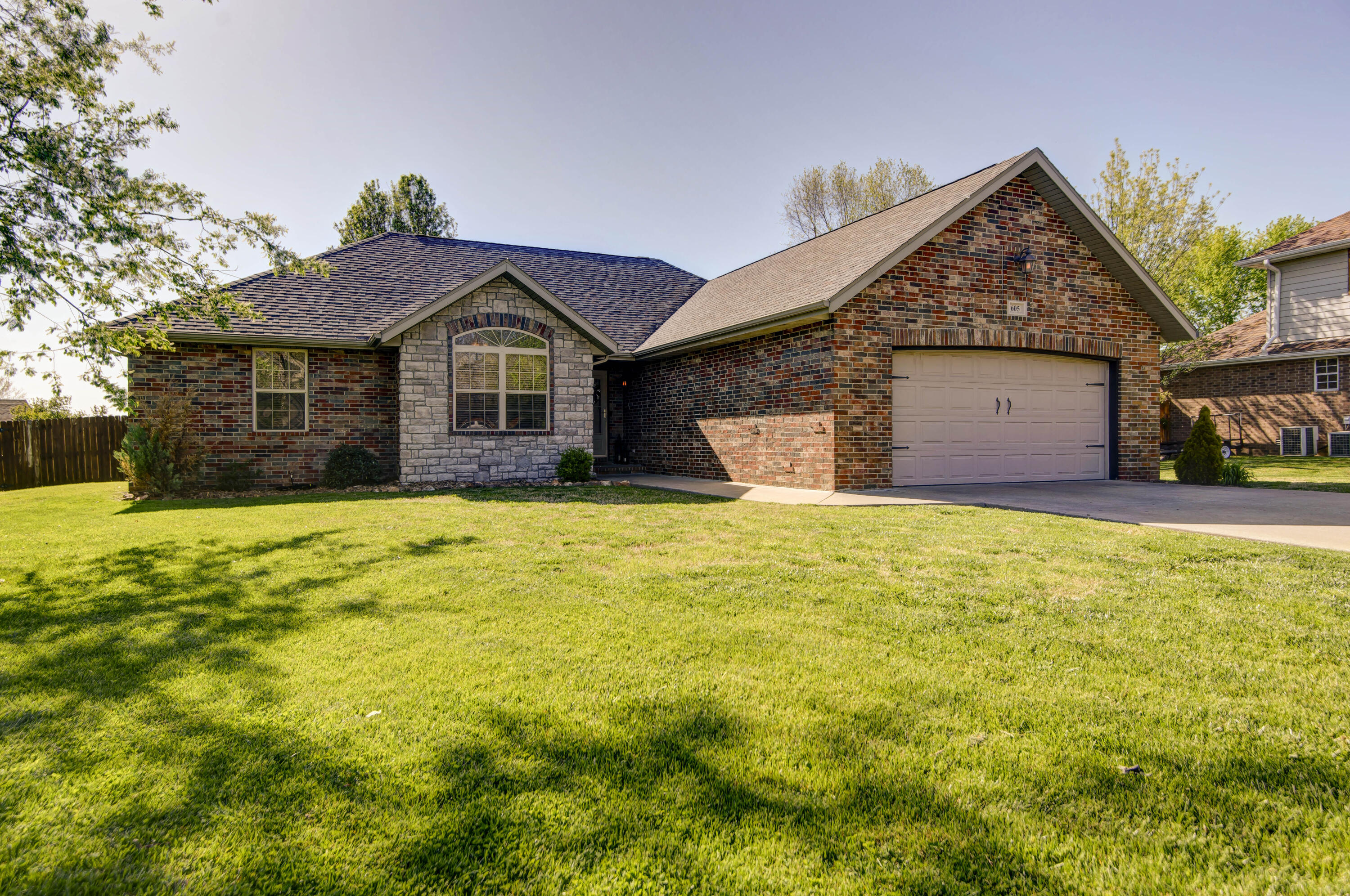 You can walk through this home from any device or computer! Just click virtual tour on this listing. Once you drive down this mature tree-lined Nixa Street and all the way back into the back of the cul-de-sac, you'll want to make this your forever home before you ever go inside. This completely move-in ready home has a ton to boast about beyond its new roof in 2021. The owner has added gorgeous granite countertops, new paint, new fixtures and so much more. The floor plan features a large living room, formal dining/office or even 4th bedroom, as well as a breakfast nook! You'll also be pleased to find a gas log fireplace, large master bedroom and bathroom that boasts a jetted bathtub, two walk-in closets, and dual vanity! Head out back and you'll find a nice refinished deck and fully privacy fenced yard! We know that the new owners are going to love it just as much as the current owners have!