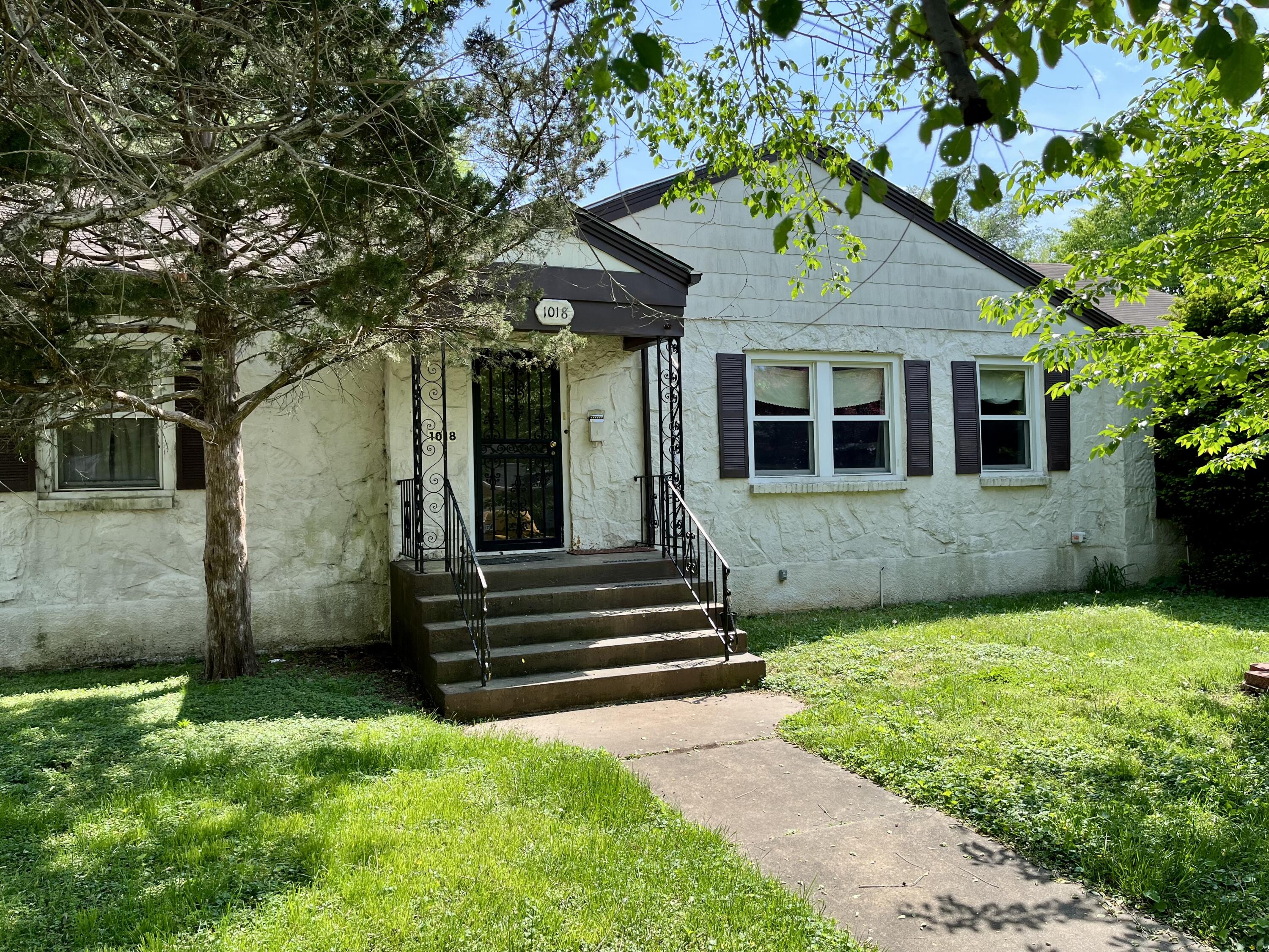 LOCATION! This home has been enjoyed by the same family since the 1960's and now offers a rare investment opportunity in the much sought after University Heights neighborhood. The home is a full stone construction on the main house and features solid hardwoods nearly throughout the whole house. Combine the existing quality construction materials with the newer vinyl windows throughout and extremely quiet/private lot, and you have a home with tremendous upside in a prestigious area making for a FANTASTIC SUMMER-TIME INVESTMENT.