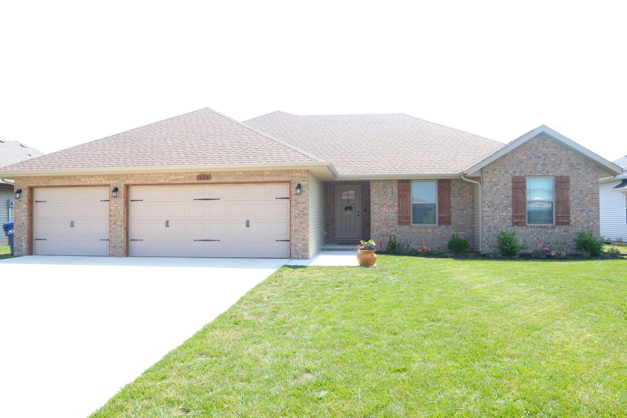 Enjoy the serenity of country living without sacrificing quality or amenities in this beautiful, pristine 4-bedroom 2 bath home located in the desirable Woodland Hills subdivision. This home boasts an open floor plan, with many upgrades! Granite countertops throughout the home, three car garage, built-in shelving, water softener with reverse osmosis water system is hooked to both the fridge and kitchen spout, mudroom with storage and built-ins, an ample-sized walk-in pantry, and much more. Enjoy the large master suite with heavenly natural lighting, an oversized walk-in closet, and room for seating while also enjoying the en-suite with dual vanities and a large shower. The backyard is flat, fully fenced, and perfect for entertaining friends and family. Come see yourself in this wonderful home by scheduling your private showing today!