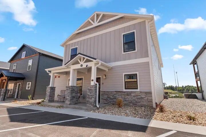Brand new  custom lodge sold turn-key with all furnishings including a brand new hot tub.This 'one of a kind' floor plan boasts a large game room on the second level and a second deck overlooking the lake.Just a few doors down from the amenity core that features a large indoor pool and outdoor pool and playground.Already has bookings for 2023 that can convey to the new owner.