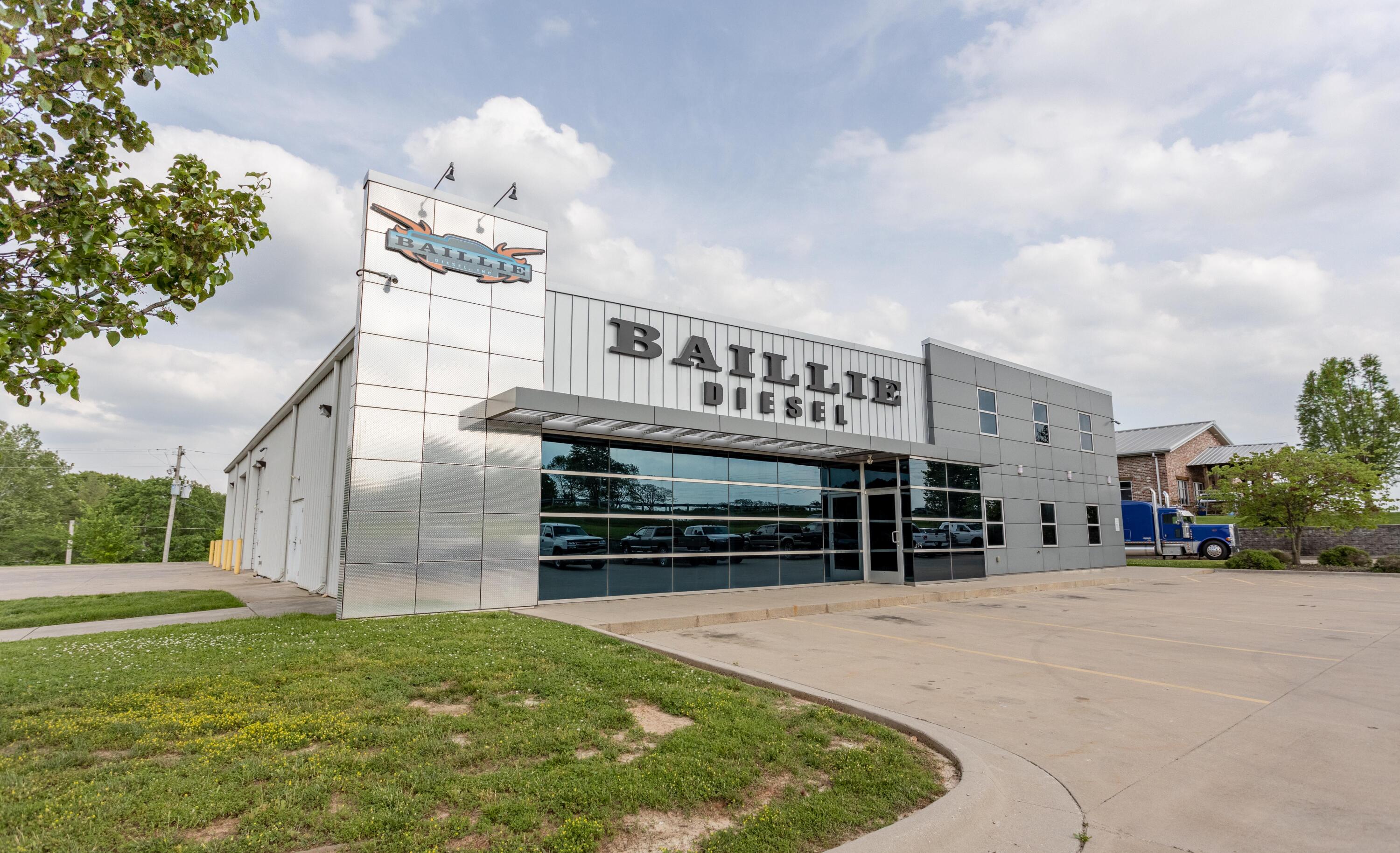 Very nice commercial building in Nixa.  Built in 2012 the first floor includes, showroom with overhead door to move in large items for display, customer waiting area with bathrooms, large office with file rooms, large parts counter and large parts area, employee breakroom with kitchen area, locker area, employee bathroom and large shop area with six, 14 foot, overhead doors and another bathroom.  Mezzanine includes waiting area/receptionist area, large office/conference room, bathroom, storage room and IT room.  Building has 3 phase power.  Parking lot is concrete and there is room north of the building on the north end of the 3.46 acre lot that could be used for future building.  Zoning is highway commercial.