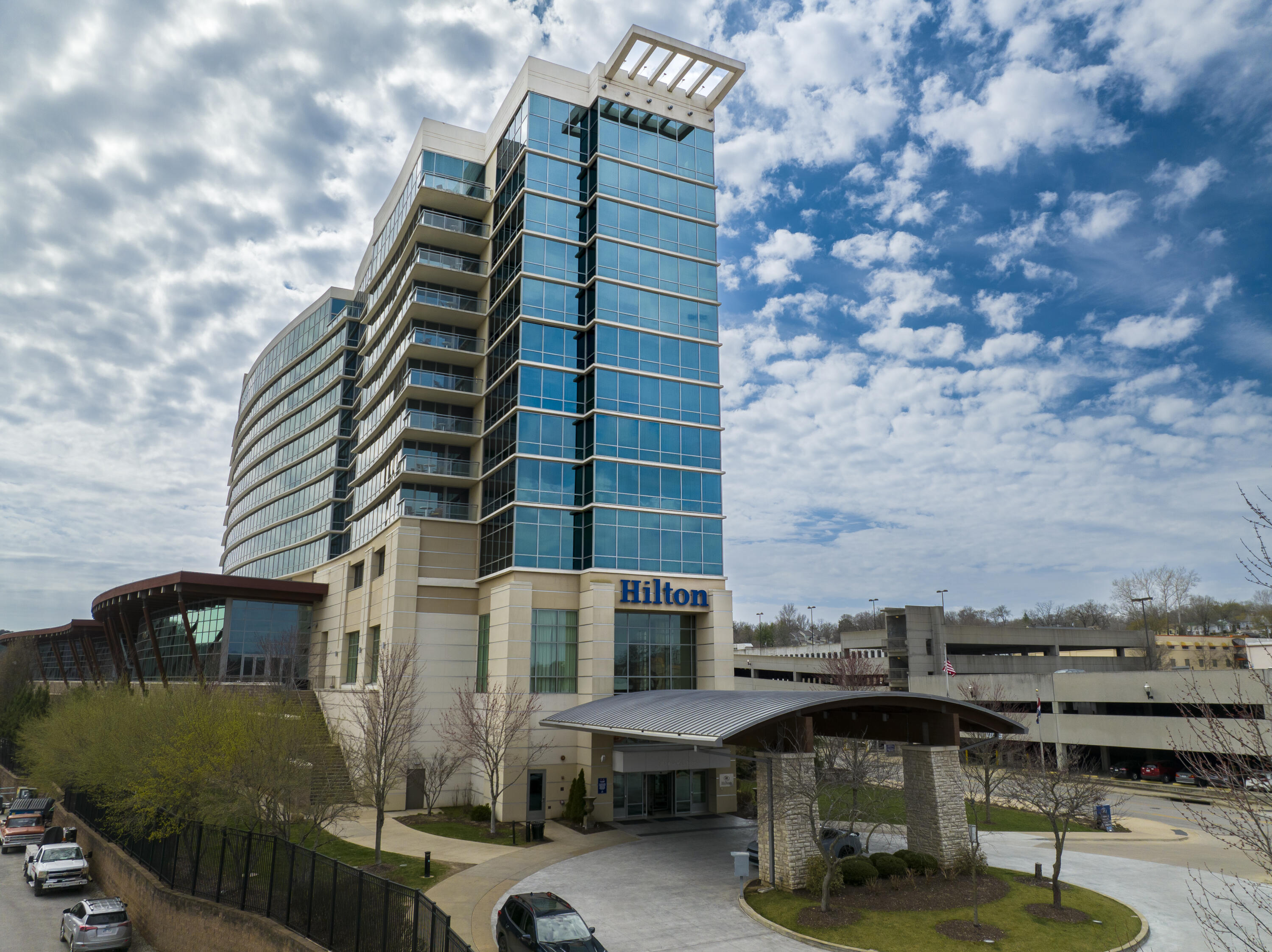 Great INVESTMENT OPPORTUNITY for this PENTHOUSE CONDO in the Hilton Convention Center located at THE BRANSON LANDING.  It is a King deluxe one-bedroom unit that comes furnished and has great rental history. Amenities include  indoor and outdoor swimming pools, exercise facility, and dining on premises. Within walking distance to all the shops, restaurants and entertainment that The Branson Landing has to offer.  Condo is managed by Hilton Hotels. Owner can  occupy this condo up to 21 days out of the year.  Call today for more information on this nightly rental condo.