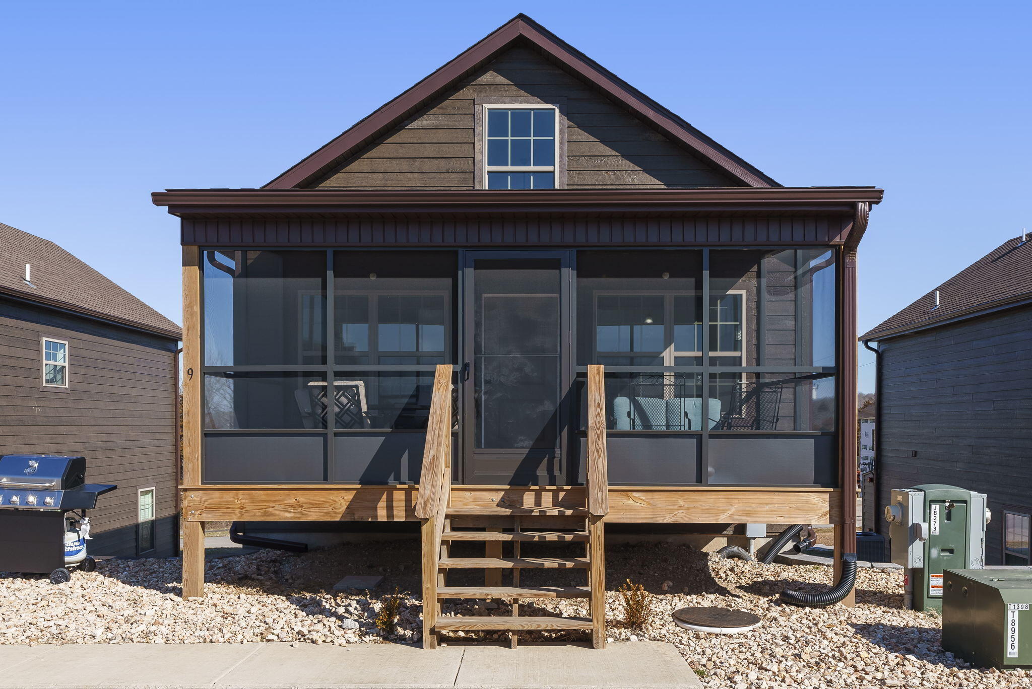 You are in for a treat with this newly constructed home that hits all the benchmarks for the best that Table Rock Lake has to offer within a stone's throw of all you need for that vacation space you have been longing for.  Peaceful serenity and captivating mornings full of wildlife and LAKE!   What more could you ask for.  Completely furnished with all that you need for either continuing nightly rental or simply just calling it ''HOME!''Simply walk across from your front porch to the community pool for relaxing and within walking distance to Baxter Marina that offers a full-service fuel dock, boat rentals, wet and dry boat storage, and more.  Baxter Campground is located soooo close for added family accommodations to make this the ideal location for large groups and special occasions.  Shopping, restaurants and Silver Dollar City close for added fun!  This development will allow for owner to manage their own rental.