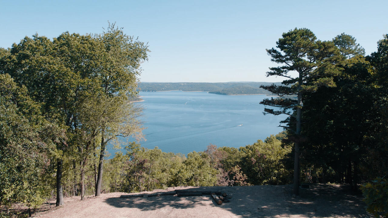 The breathtaking panoramic views of Table Rock are on full display year-round at 145 In The Woods Rd! This kind of oasis is becoming increasingly difficult to find.This 32-acre parcel offers you the relaxation and solitude you have desired. Formerly used as a primary residence, you will also experience an excellent balance of gently rolling hillsides, mature ponderosa pines and oaks, abundant wildlife, multiple prestigious build sites, and countless days taking refuge in nature's beauty. The acreage has been partially excavated while maintaining privacy.The property has been maintained with a private entrance, well water, septic, electricity, and all less than 5 miles from the heart of Kimberling City. You're also less than 10 miles from hundreds of first-class entertainment and shopping options in Branson.