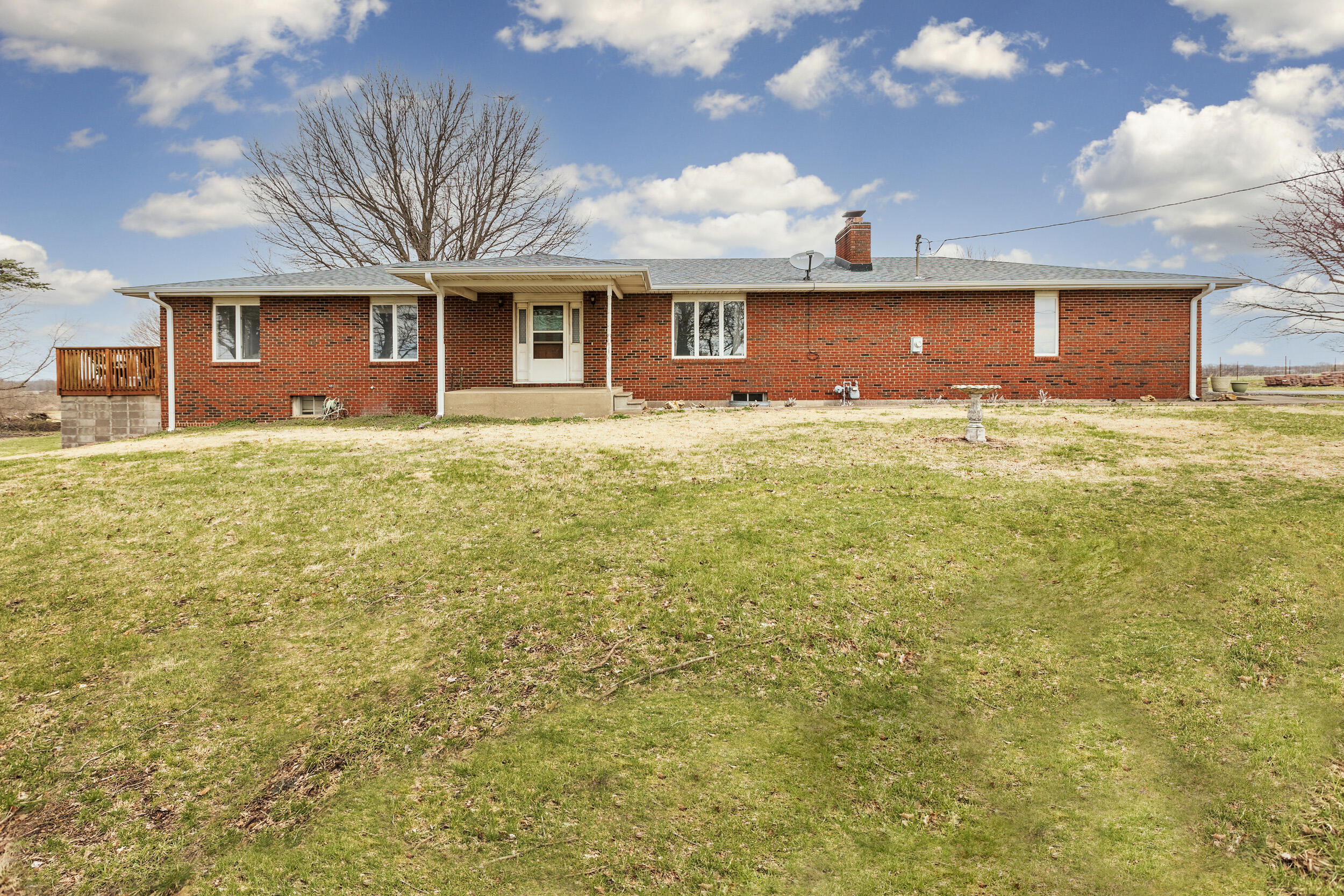Don't miss this rare opportunity to own this 5 bedroom/3bathroom/2 car garage home, plus 25'x40' shop building on 15 ACRES. Perfect for a family that wants to spread out, operate a small farm, or for a investment opportunity or future land development. Easy access to both James river and I -44.