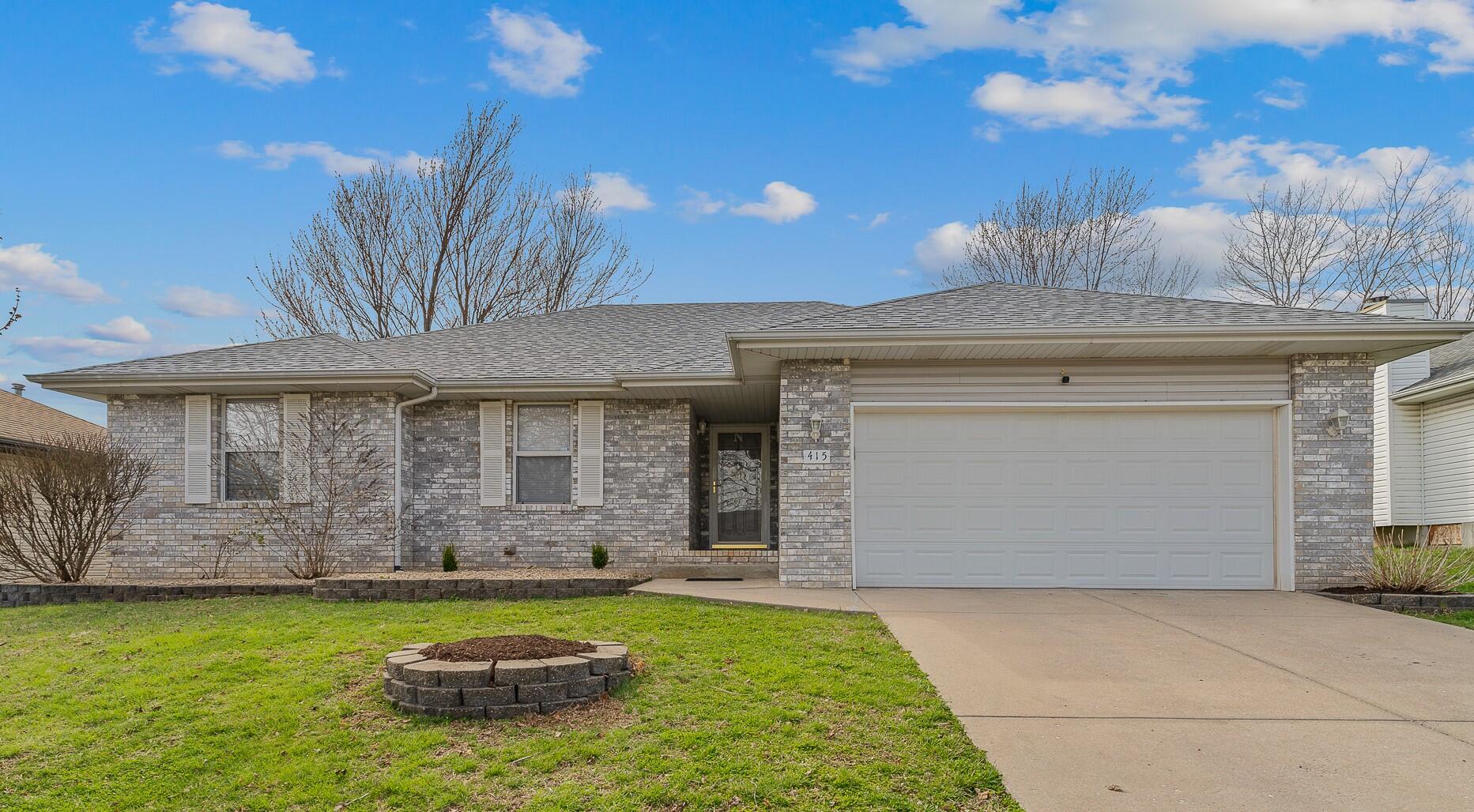 This super tidy 3/2/2 in Nixa school demands to be seen!  With all of the major systems being newer, this home is worry free!  Roof and HVAC are 3 years old and the water heater and softener are new this year! The home has wood-look vinyl plank in all but the bedrooms, making the home easy to clean.  The kitchen is updated and timelessly classy.  It features white cabinets, a granite bar height peninsula with seating, and a subway tile backsplash.  The living room features plenty of space, a gas fireplace, and built in storage.  All three bedrooms are generously sized and are floored with clean, soft wall-to-wall carpet.  The back yard is privacy fenced, has a storage shed, and a large deck platform.  This home, located in a quiet neighborhood is conveniently located close to Nixa Jr High, stores, and restaurants.