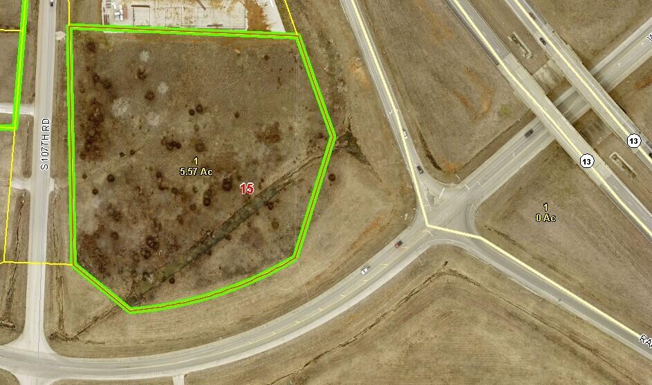 Prime commercial development property with Highway 13 visibility.  This property has 3 highly traveled road frontages including Highway 13, Wommack Ave/S 107th RD & T Highway.  No Restrictions!