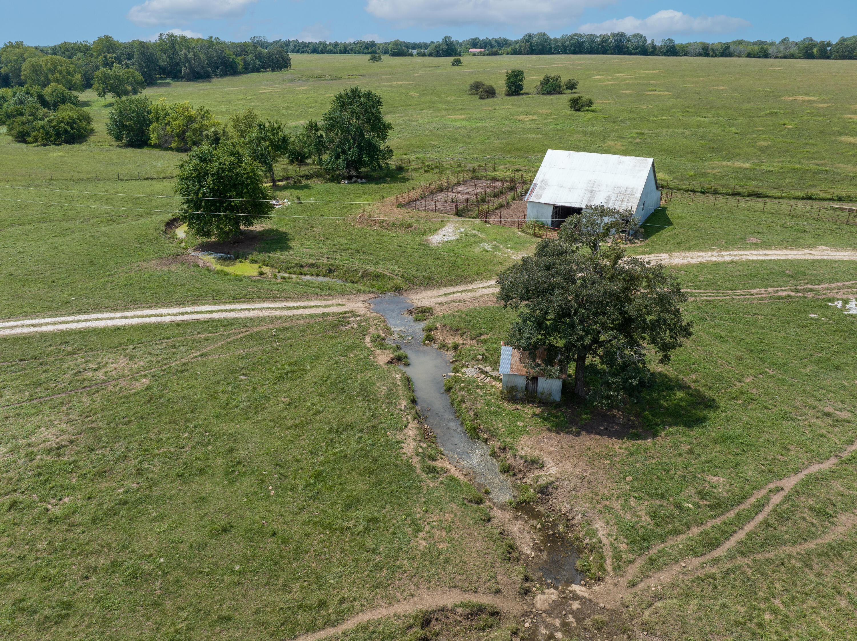 Great cattle ranch conveniently located just west of Hwy 13 south of Bolivar MO. The property features pipe corrals, working barn, open pastures, cross fencing and ponds. Easy access to both Springfield and Bolivar. Available with less acreage.