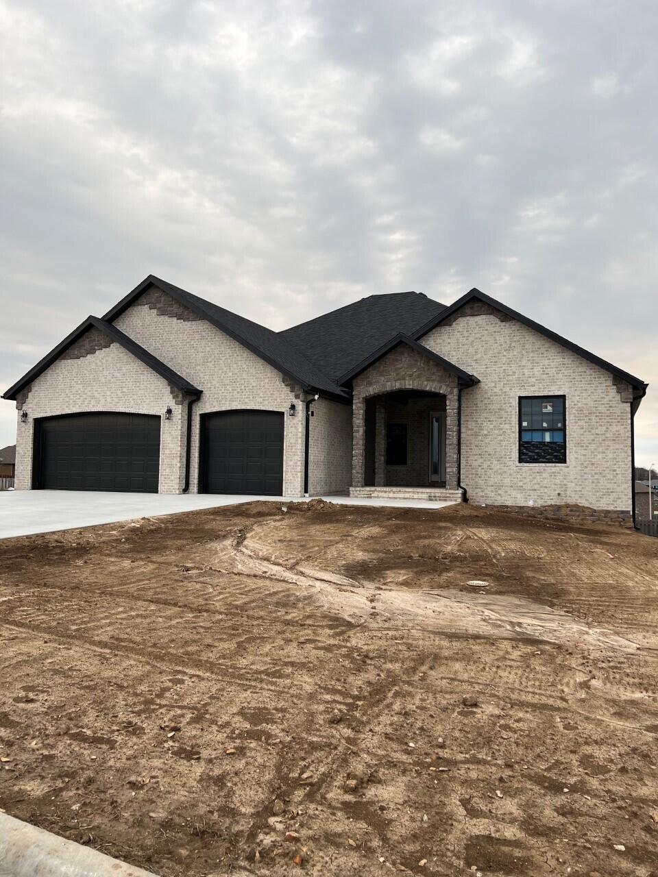 Welcome to this beautiful home at Lakes at Wild Horse Subdivision that is almost completed! This home has the quality you are looking for with many upgrades and features 4 bedrooms, 3 baths, office and a 3 car garage. All brick, impressive open floor plan with tall ceilings throughout, custom cabinets and beautiful quartz counters in kitchen and baths, stainless appliances, huge walk-in pantry and beautiful hardwood flooring throughout entire house. Very spacious master bedroom with his & her walk-in closet with custom shelving, his and her vanity and beautiful tiled shower. 15x17 John Deere Room with a window and heat & air. Sprinkler system in front and backyard and much more. Subdivision pool, children's play area, tennis & basketball court, ponds and more. Great location across from Hickory Hills Schools! See it today!