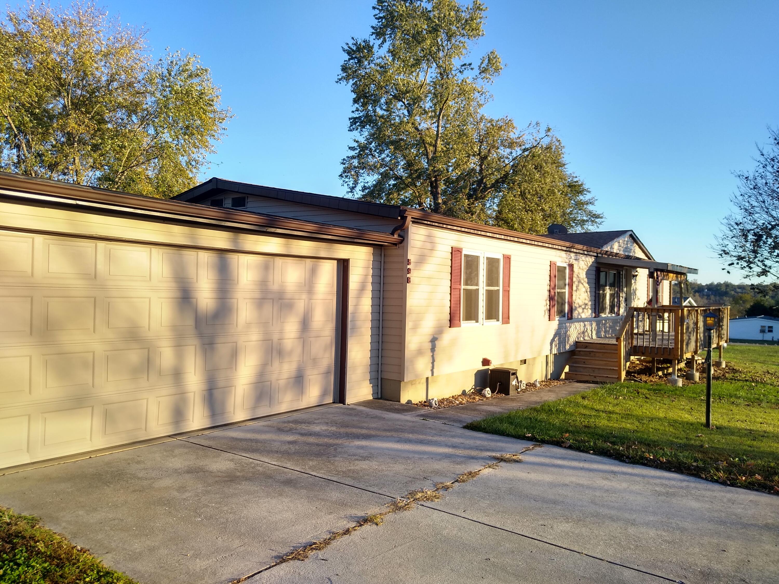 A Very Well Maintained 3 BDRM 2 BA Home on a Level, Corner Lot that has it All.  Home has many updates so many to list inside and out.  New Windows, Doors and new Front Deck are just a few.  Spacious Floor Plan with Large Kitchen that has 2 Pantry Closets, Knotty Pine kitchen cabinets and lots of counter space.  Kitchen and Dining area provides plenty of room for Family and Friends gatherings. You'll love the Master Bedroom & updated Master Bath with Walk-In Shower and Vanity.  Enjoy the enclosed Sunroom no matter what the weather is outside.  The back deck is nice for Barbeques and sitting in the shade or watching the sunrise.  The fenced backyard has a 10x12 Tuff Shed for your yard and gardening tools.  There is a raised garden bed to the side.  Attached to the Home is an oversized Garage that has a workbench with plenty of space for Tools and Equipment.  A Toro 42 inch zero turn Mower and a 6x10 Trailer stay.   A large driveway provides plenty of additional parking for vehicles or a boat.  Lake Taneycomo and Bull Shoals are so close for fishing and boating activities.  Boat launches are at Rockaway Beach and Empire Park in Forsyth.  A perfect location for easy access to Branson or Springfield.  Forsyth is just a few miles for grocery shopping, errands and a trip to the Farmers Market on Saturdays.  Empire Park and Swan Park in Forsyth are Beautiful Parks to take a walk or enjoy taking the Family out for a Picnic.  The Location and the Home are Great, you will feel right at Home.